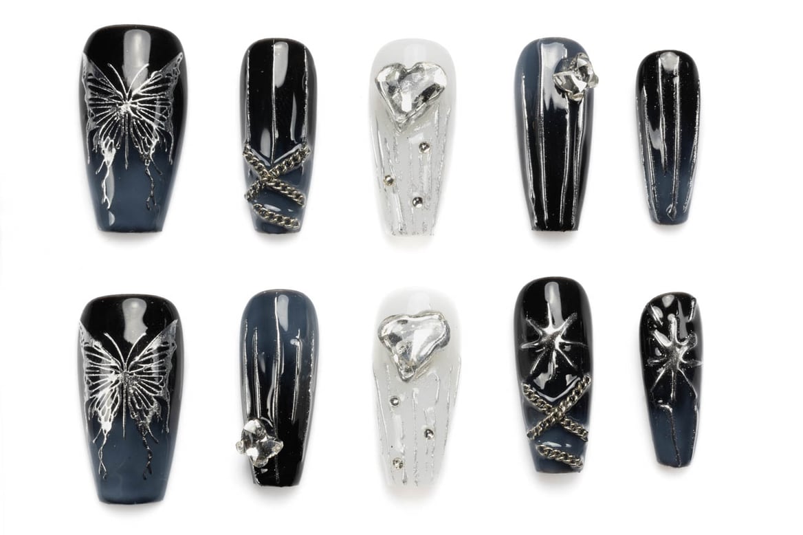 Gothic press-on coffin nails with black and white butterfly design, rhinestones, and chain embellishments