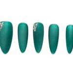 Emerald green medium-length almond press-on nails with rhinestone accents and shimmer finish