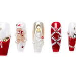 Festive medium coffin press-on nails with Christmas designs including gingerbread men, trees, glitter, and pearl embellishments