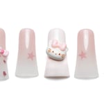 Pink ombre press-on nails decorated with Hello Kitty faces, bows, and star accents in short square style