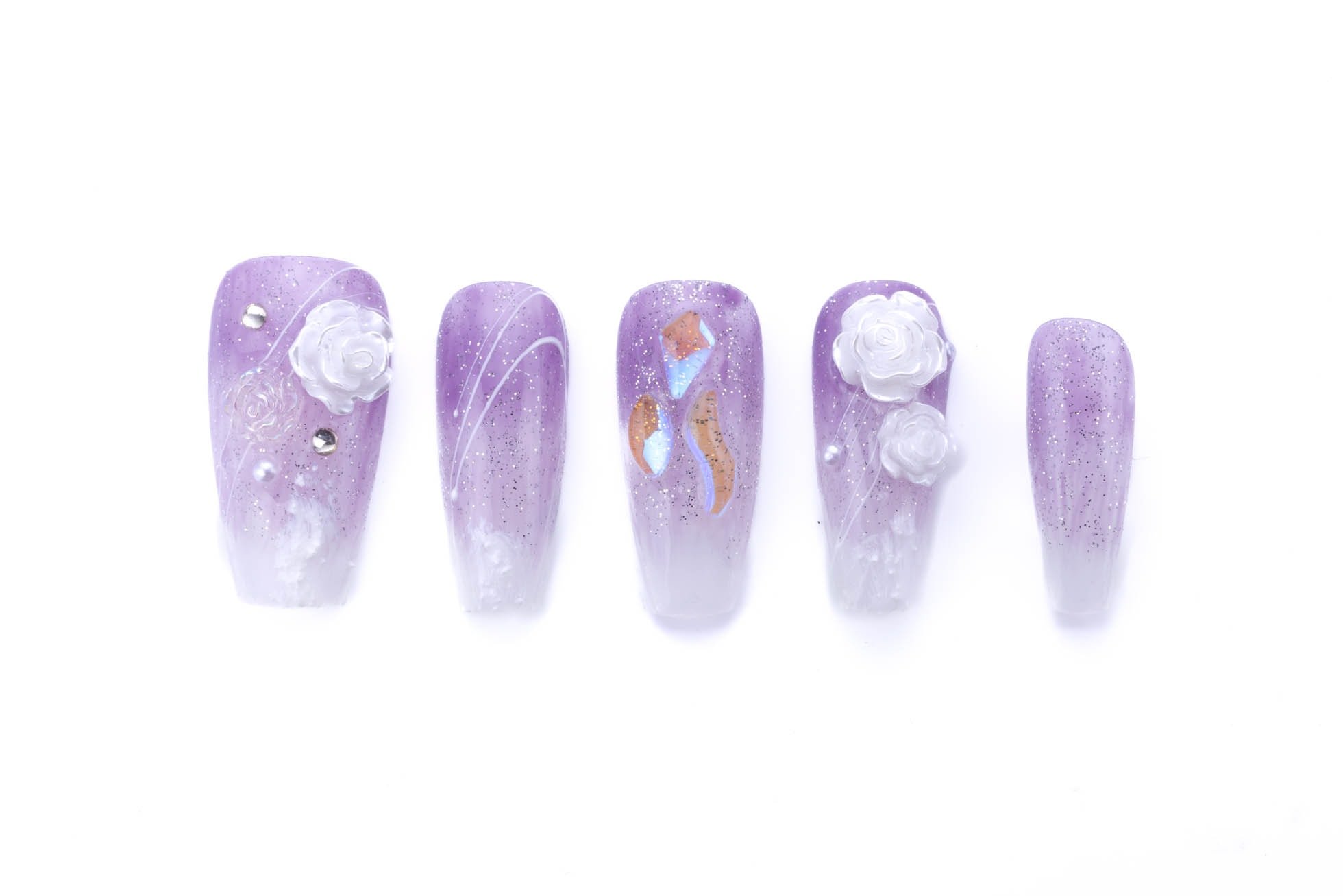 Medium coffin press-on nails with purple ombre gradient, decorative 3D white roses, and sparkling silver accents for a romantic manicure