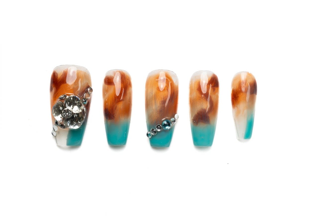 Turquoise and bronze ombre press-on nails with swirl design and rhinestone accents - Sunken Jewels collection