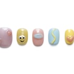 Short round press-on nails in pastel colors with 3D hearts, smiley faces, and colorful dots, perfect for a cute everyday manicure