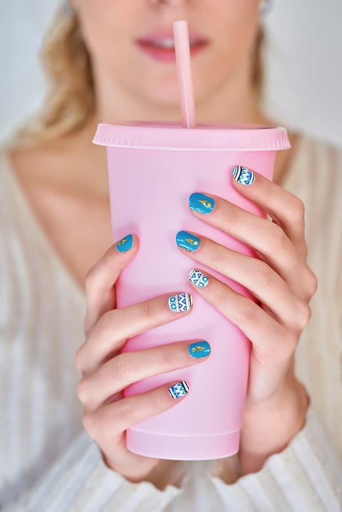 Close Up Of A Woman With Colourful Manicure Nails 2023 11 27 05 08 40 Utc (1)