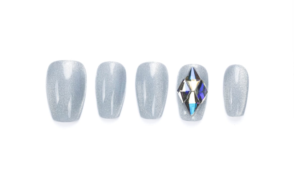 Shimmering silver coffin press-on nails with crystal accent and medium length