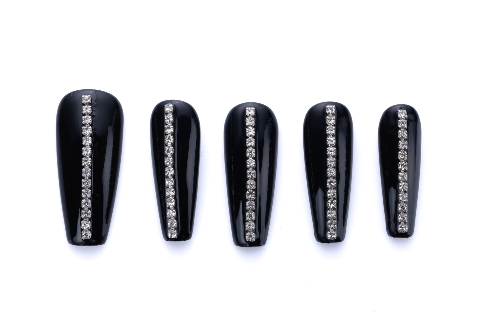 Glossy black press-on coffin nails with a vertical stripe of sparkling rhinestones, perfect for a glamorous and sophisticated look.